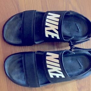Nike sandals black with white logo